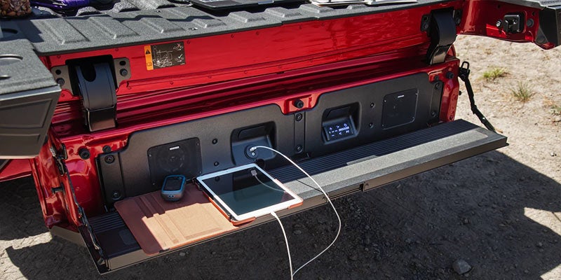 Backside of a red Sierra 1500 showing its charging ports to charge any type of electronic